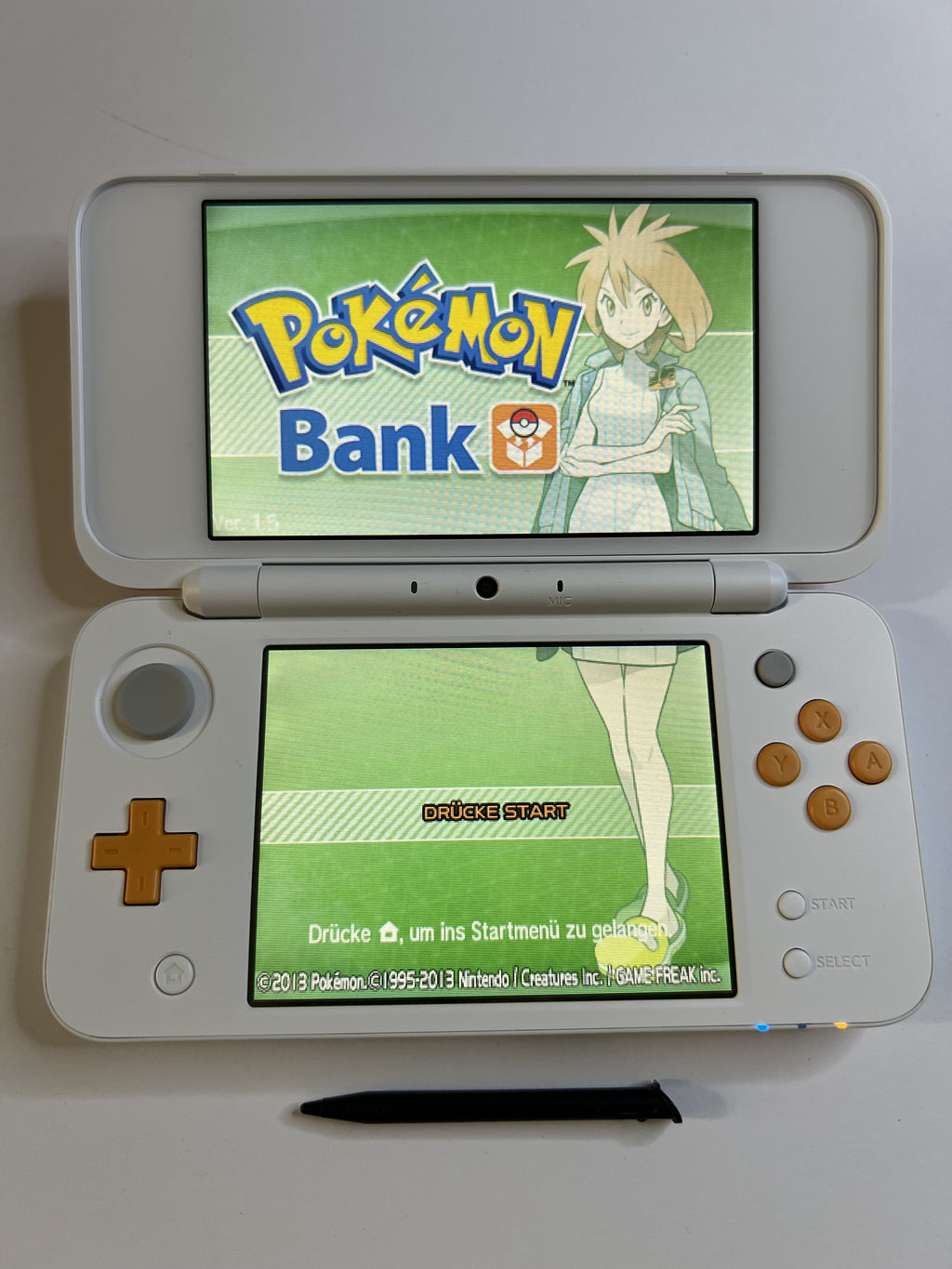 Nintendo New 2DS XL Konsole in weiß orange mit 128GB, Pokemon Bank, Poke Mover & vielen Extras